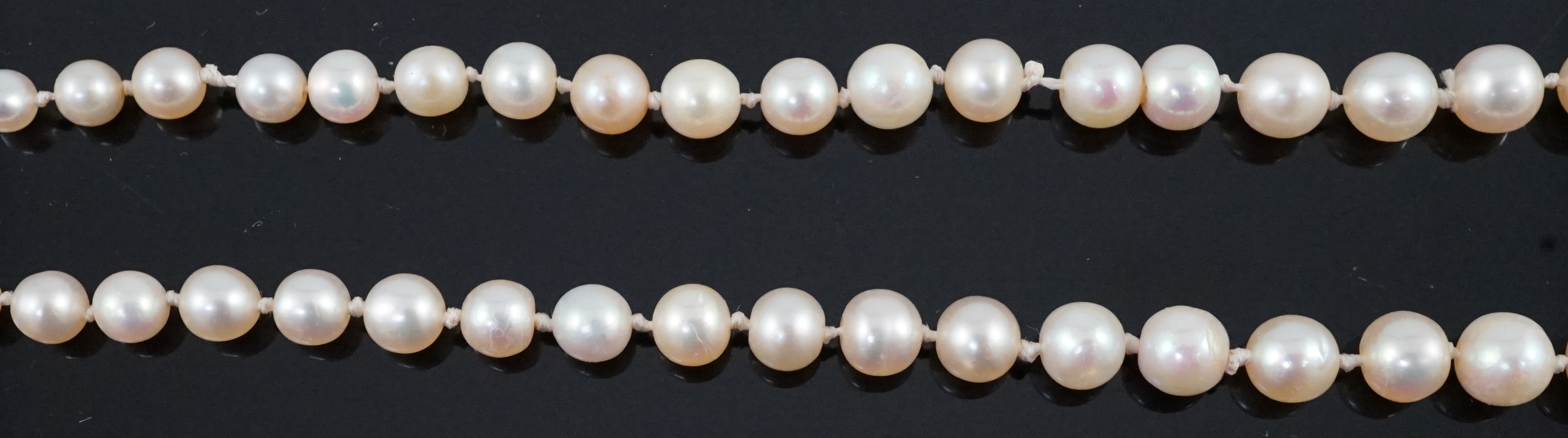 A single strand graduated natural saltwater pearl necklace, with AnchorCert report dated 31st March, 2023, with diamond set torpedo shaped clasp